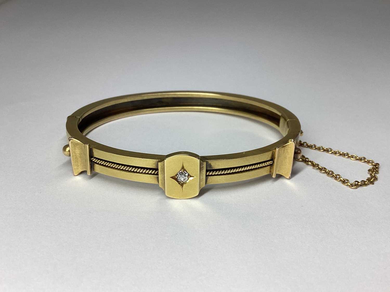 Lot 95 - An Antique Style Diamond Set Hinged Bangle,...