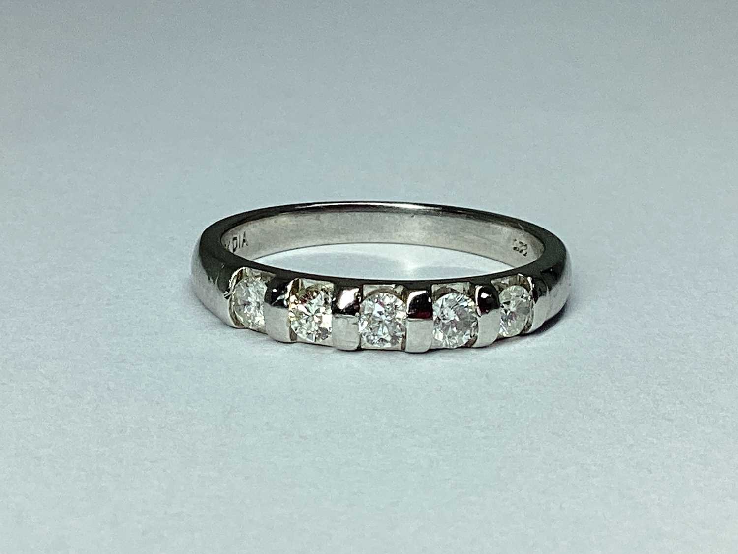 Lot 58 - A 9ct White Gold Five Stone Diamond Set Ring,...
