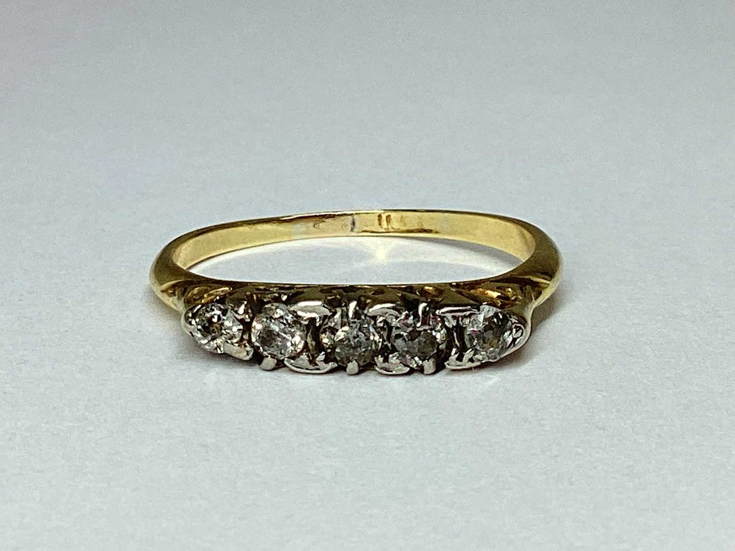 Lot 46 - A Graduated Five Stone Diamond Ring, within...