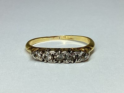 Lot 46 - A Graduated Five Stone Diamond Ring, within...