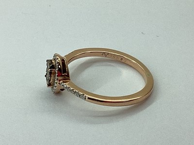 Lot 52 - A Modern Rose Gold Chocolate and White Diamond...
