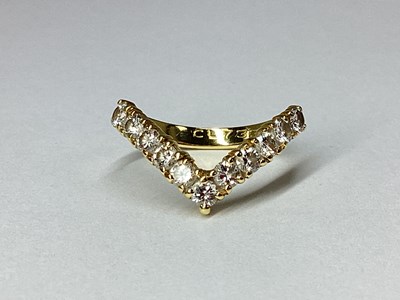 Lot 44 - An 18ct Gold Diamond Set Wishbone Ring, the...