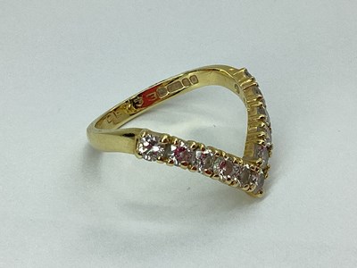 Lot 44 - An 18ct Gold Diamond Set Wishbone Ring, the...