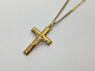 Lot 70 - A Modern Crucifix Pendant, stamped "375", on...