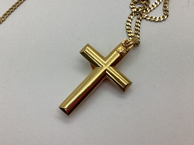 Lot 70 - A Modern Crucifix Pendant, stamped "375", on...
