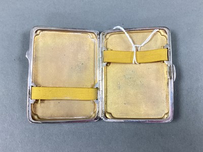 Lot 6 - A Hallmarked Silver Cigarette Case, engine...