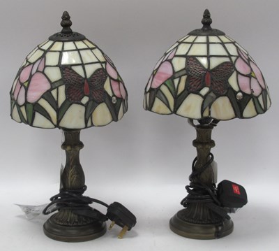 Lot 1229 - A pair of Tiffany-style table lamps, each with...