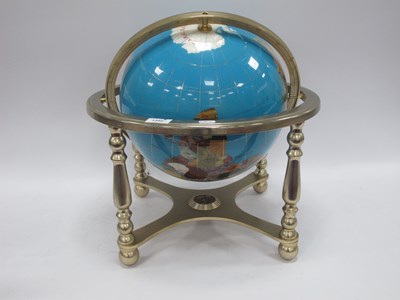 Lot 1392 - A decorative gemstone world globe within a...