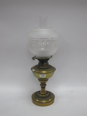Lot 1391 - An antique brass oil lamp with frosted glass...