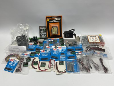 Lot 746 - A collection of model railway electrical...
