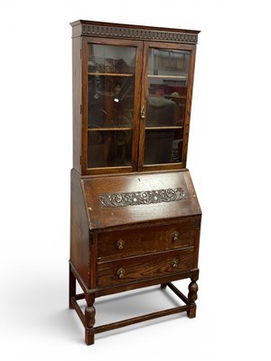 Lot 1523 - 1930s Oak Bureau Bookcase with glazed doors...