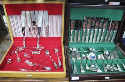 Lot 1246 - Two wooden canteens of silver-plated cutlery,...