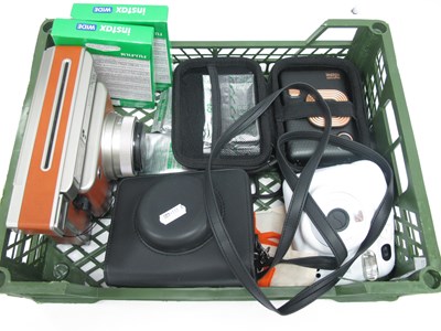Lot 1323 - Fujifilm Instax II Camera, together with...