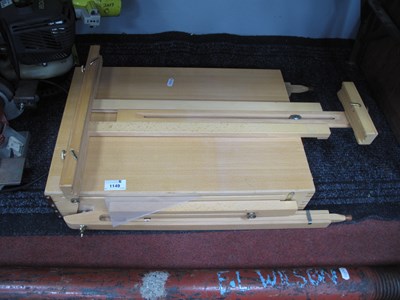 Lot 1149 - A contemporary wooden metamorphic French box...