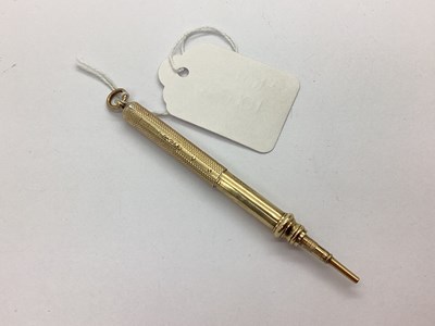 Lot 198 - A 9ct Gold Propelling Pencil, of engine turned...