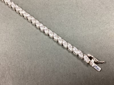 Lot 81 - CARAT London; A Claw Set Marquise Tennis...