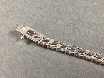 Lot 81 - CARAT London; A Claw Set Marquise Tennis...