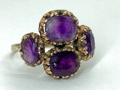 Lot 47 - A Large Four Stone Dress Ring, the...