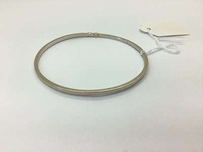 Lot 74 - A Modern Plain Hollow Bangle, stamped "375"...