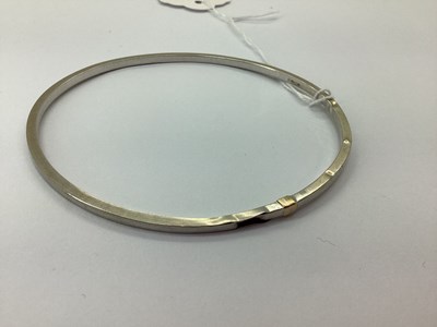 Lot 74 - A Modern Plain Hollow Bangle, stamped "375"...
