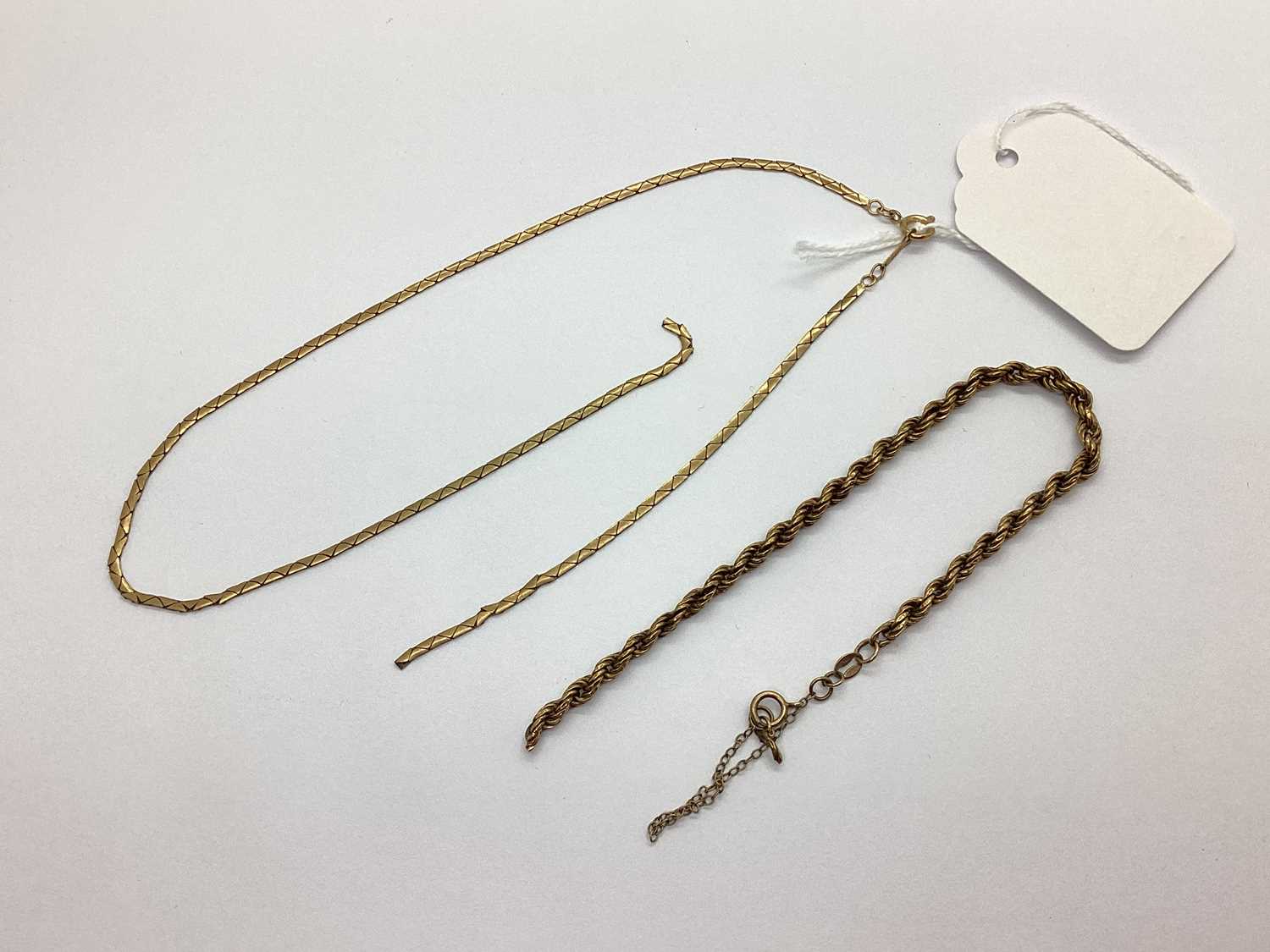 Lot 77 - A Fancy Flat Link Chain, (broken), stamped...