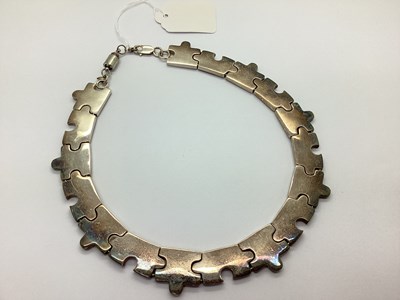 Lot 105 - A Novelty Hallmarked Silver Jigsaw Collarette...