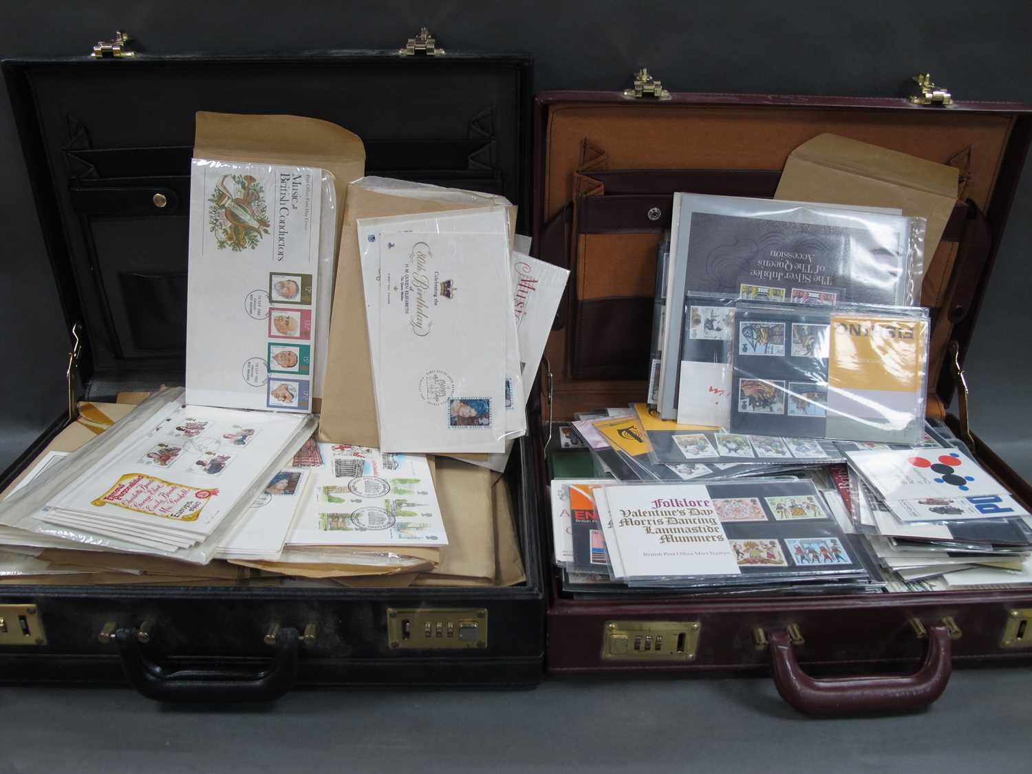 Lot 302 - Stamps; A black briefcase containing over 160...