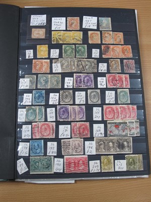 Lot 328 - Stamps; A stockbook containing a World stamp...