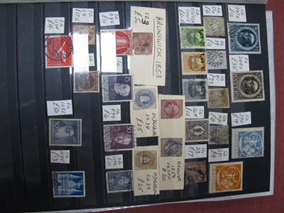 Lot 328 - Stamps; A stockbook containing a World stamp...