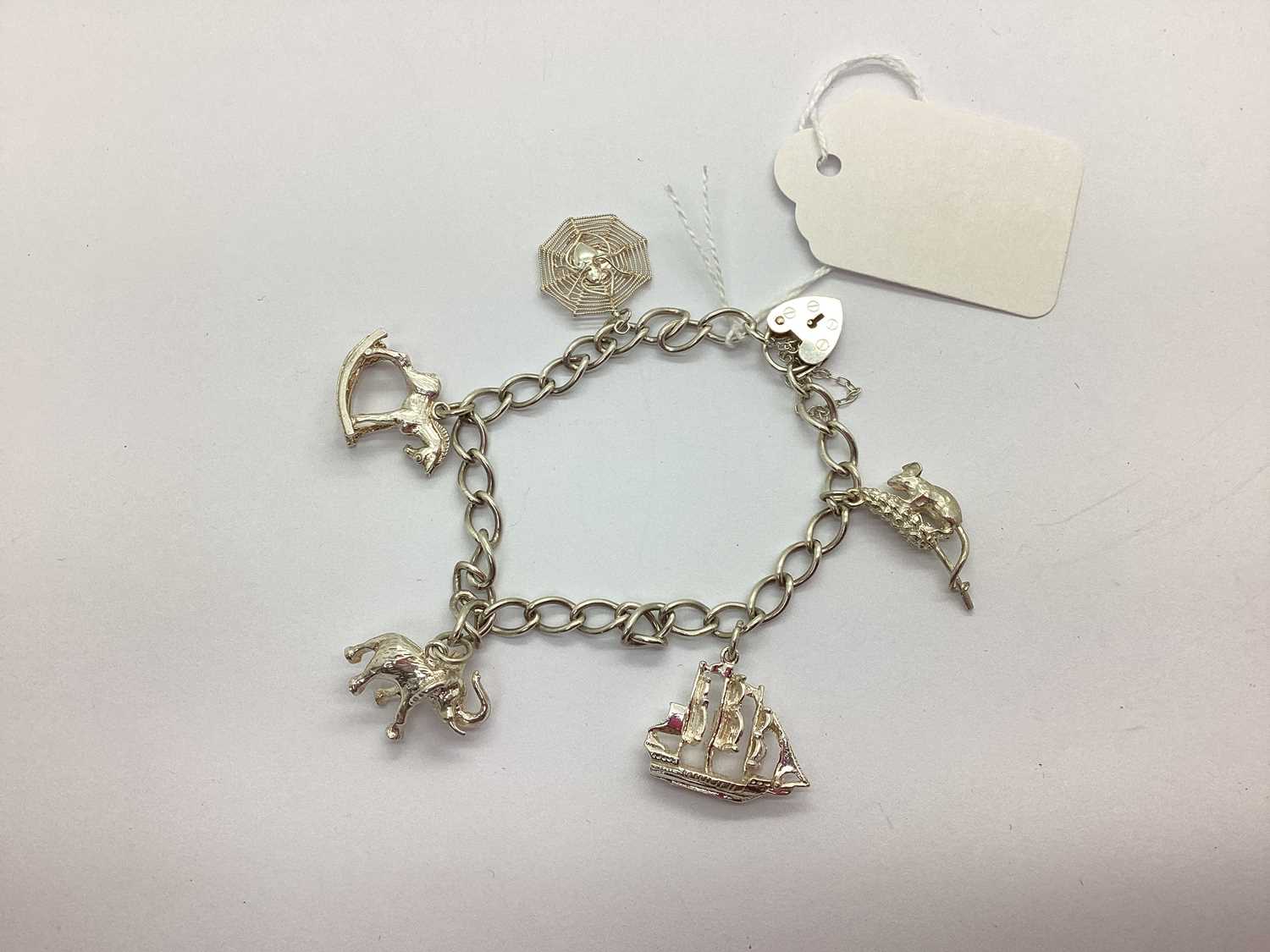 Lot 93 - A Hallmarked Silver Curb Link Bracelet,...