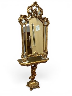 Lot 1452 - A Victorian-style console table and overmantel...