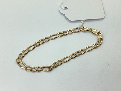 Lot 80 - A Figaro Link Bracelet, overall length...