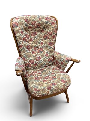 Lot 1450 - Ercol Medium Colour Wood Easy Chair with...