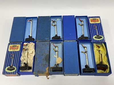 Lot 722 - Seven Hornby Dublo 3-Rail electric signal arms,...