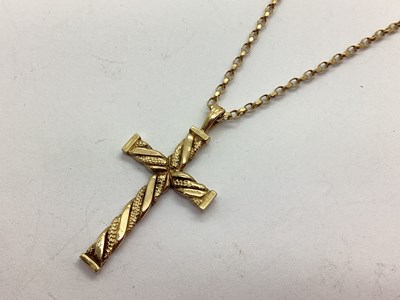 Lot 90 - A Textured Cross Pendant, of alternate twist...