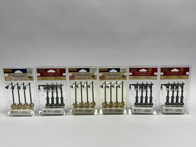 Lot 570 - Six packs of Lemax lamp standards including...