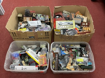 Lot 435 - Four containers with the contents of a model...
