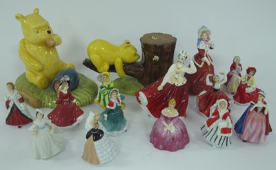 Lot 1165 - Royal Doulton porcelain figurines, including...