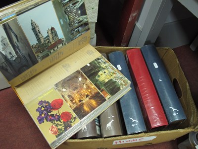 Lot 1064 - Seven albums of vintage postcards, in very...