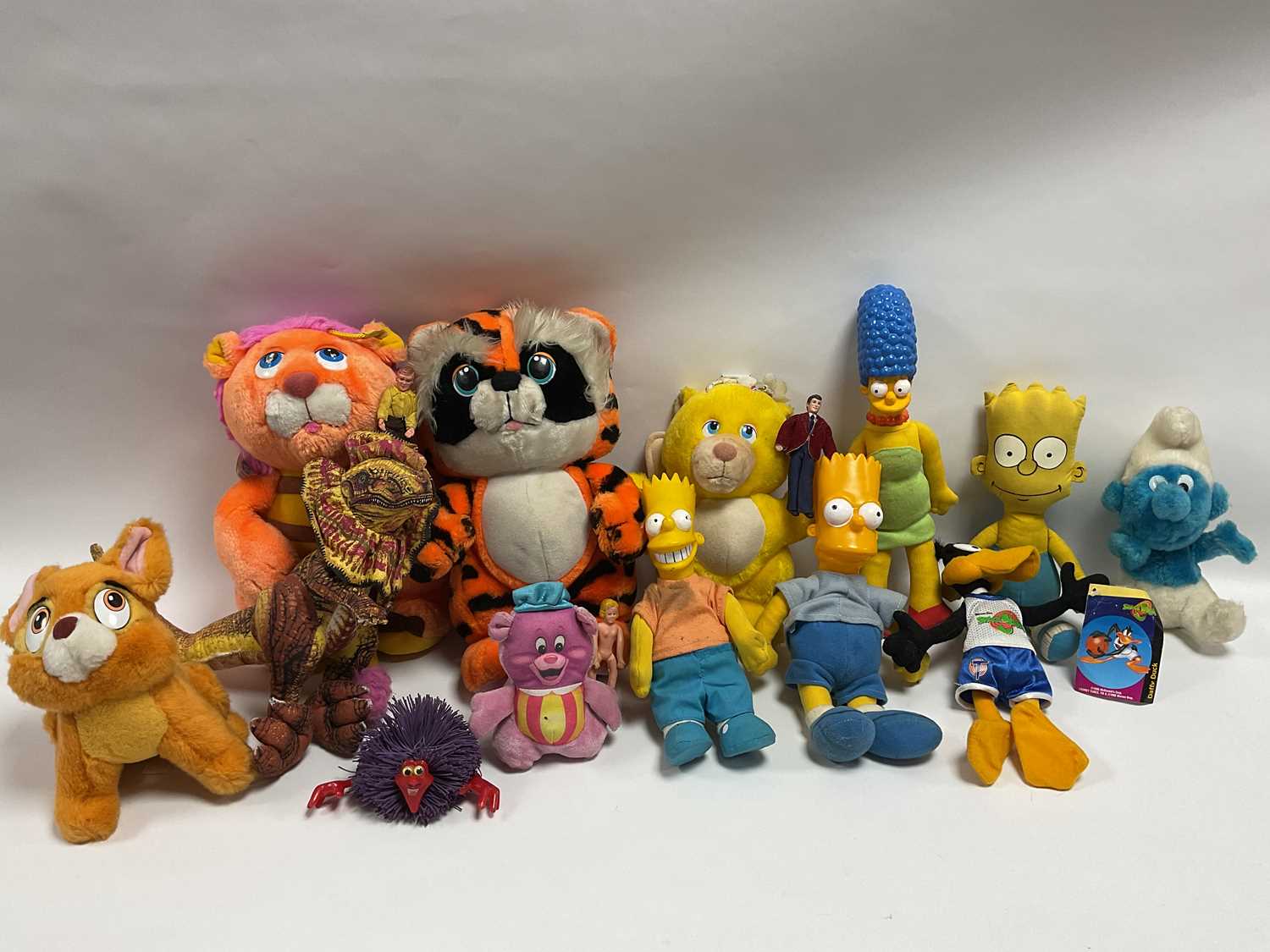 Lot 374 - Sixteen 1980's and later soft toys and dolls...