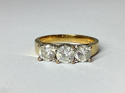 Lot 77 - A 9ct Gold Three Stone Ring, claw set...
