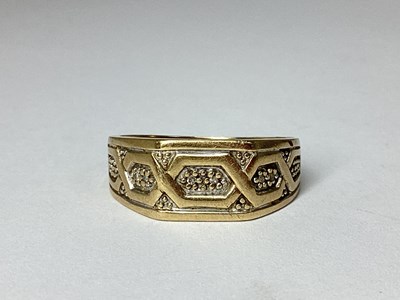 Lot 41 - A Wide 9ct Gold Geometric Pattern Ring, of...