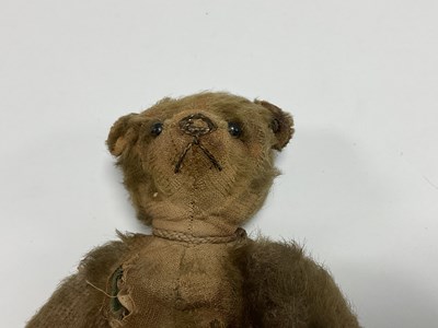 Lot 363 - A Circa Early XX century teddy bear, straw...