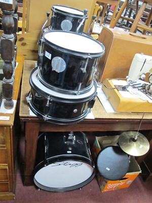 Lot 1106 - Black Stagg Drum Kit, comprising nine pieces,...