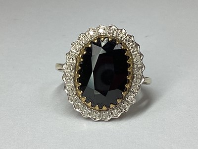 Lot 57 - A Large 9ct Gold Sapphire and Diamond Cluster...