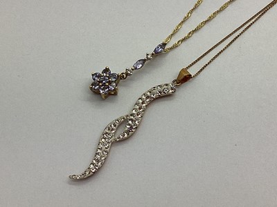 Lot 83 - A Modern Dainty Sparkly Pendant, stamped "375",...