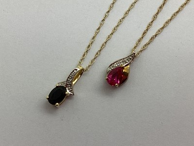 Lot 85 - A Modern Dainty Single Stone Sapphire Pendant,...