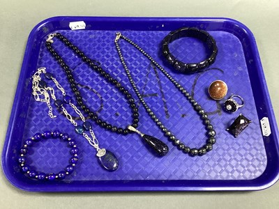 Lot 238 - A Blue Goldstone Bead Necklace, of uniform...