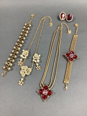 Lot 243 - Butler & Wilson; A Double Row Gilt Coloured...