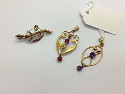 Lot 110 - An Edwardian Openwork Pendant, with claw set...